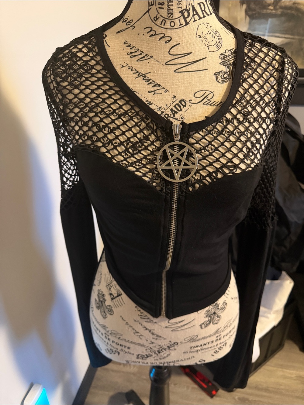 Killstar Black Mesh Zip-Front Long Sleeve Top with Pentagram zipper.